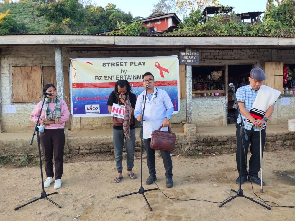 BZ Entertainment team performing a play as part of it HIV awareness campaign at Old Tesen village, Peren district recently.